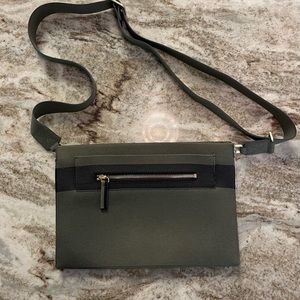 Rothy’s dual zip sage green crossbody bag.